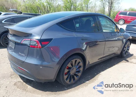 2023 Tesla Model Y Performance Dual Motor All-Wheel Drive z USA, uszkodzony, nr VIN 7SAYGDEF9PF972200